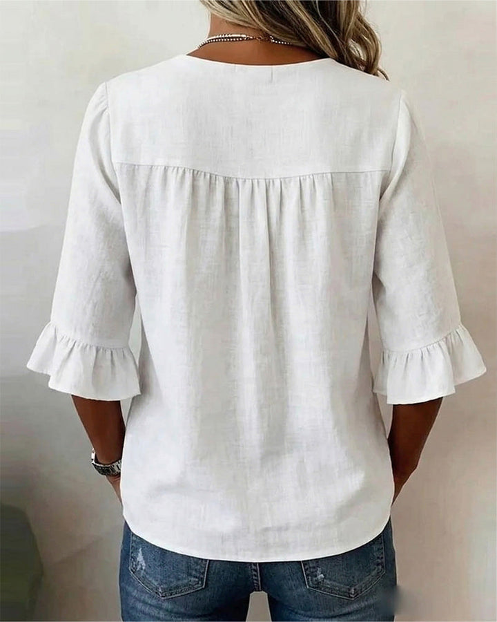 V-Neck Blouse with Wooden Buttons and Ruffled Sleeves