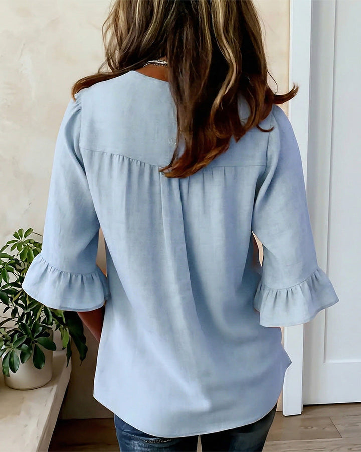V-Neck Blouse with Wooden Buttons and Ruffled Sleeves